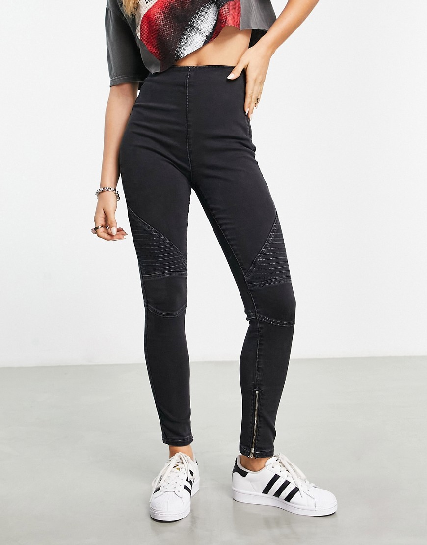 skinny jeans with motorcross styling in washed black