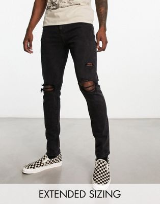 ASOS DESIGN skinny jeans with rips in in black