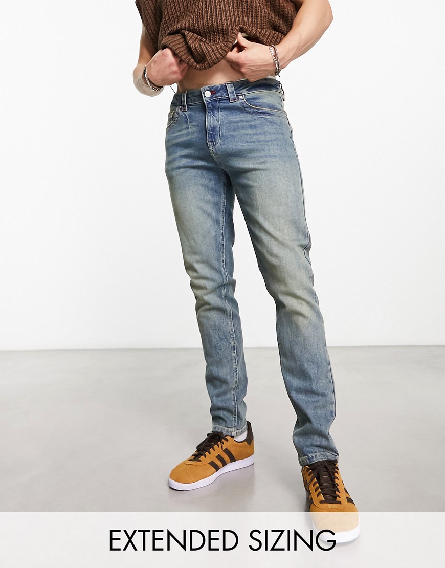 Asos Design Skinny Jeans In Y2k Heavy Tinted Mid Wash Blue