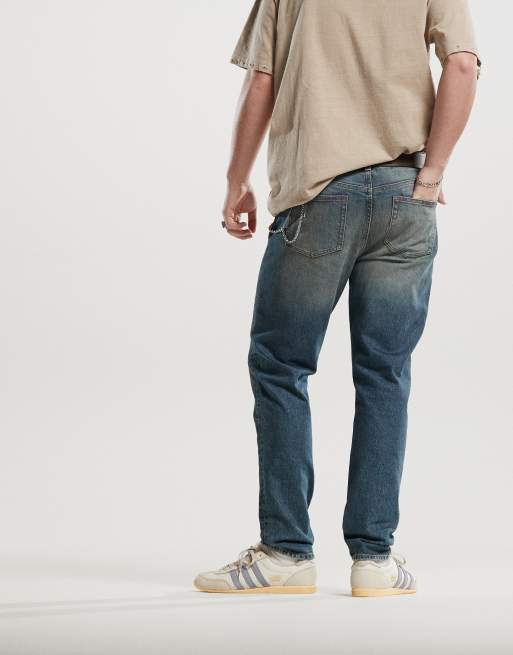 ASOS DESIGN skinny jeans with tint in dark wash blue, 2 of 5