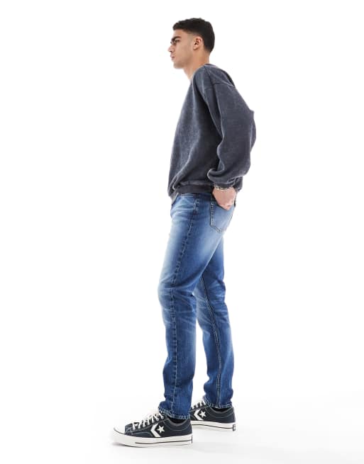 ASOS DESIGN skinny jeans with tint in mid wash blue, 3 of 5