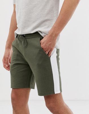 ASOS DESIGN - Skinny jersey short met zijstreep in kaki-Groen