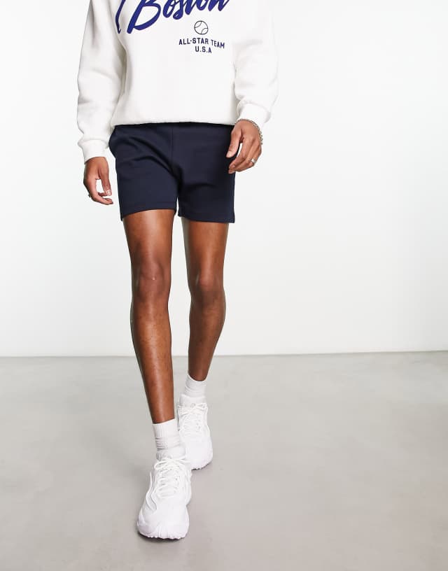 ASOS DESIGN skinny jersey shorter length shorts in navy