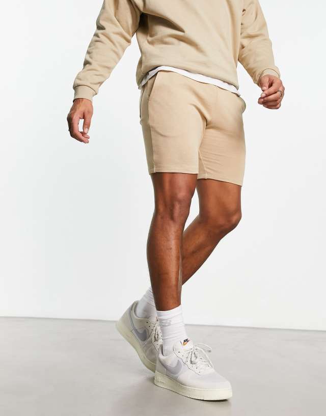 ASOS DESIGN skinny jersey shorts in beige