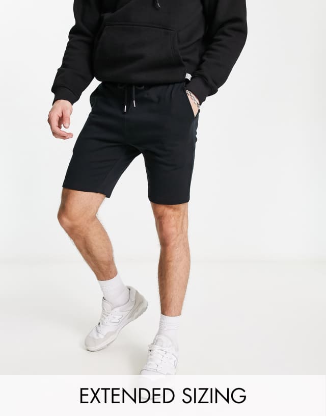 ASOS DESIGN skinny jersey shorts in black