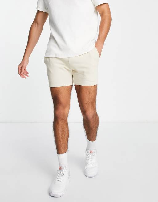 ASOS DESIGN skinny jersey shorts in shorter length 2 pack in beige/navy, 4 of 4