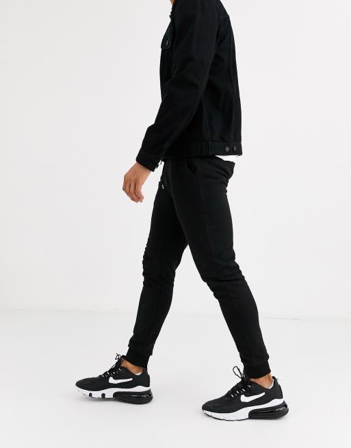 ASOS DESIGN skinny joggers in black