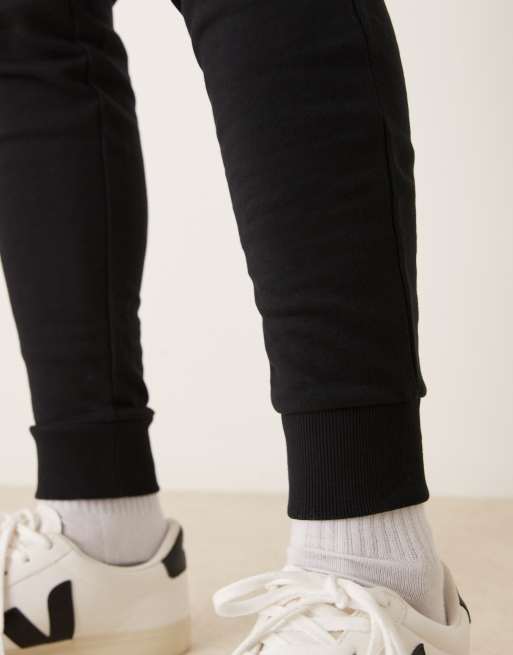 ASOS DESIGN tapered joggers in black