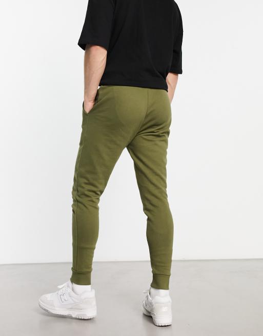 ASOS DESIGN tapered joggers in olive green