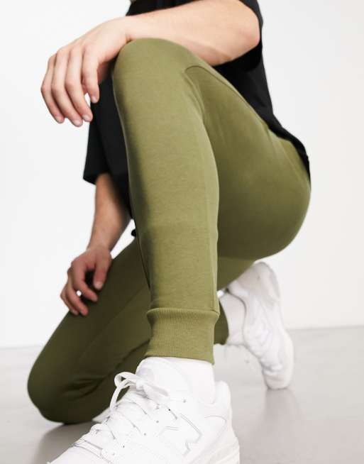 ASOS DESIGN tapered joggers in olive green