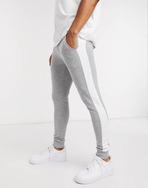 Asos design skinny joggers with store side stripe