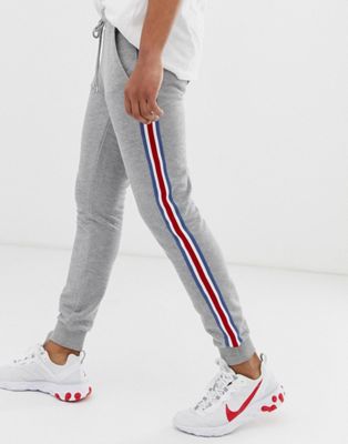 ASOS DESIGN skinny joggers with side stripe taping in grey marl | ASOS