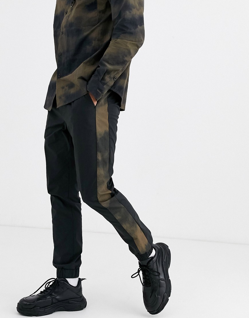 ASOS DESIGN - Skinny joggingbroek met elastische taille en zijstreep in zwart, combi-set