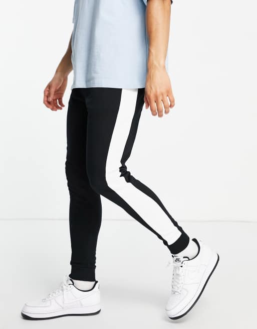 ASOS DESIGN - Skinny joggingbroek met zijstreep in zwart - BLACK