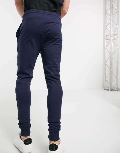 ASOS DESIGN - Skinny lichtgewicht joggingbroek in marineblauw, 2 van 4