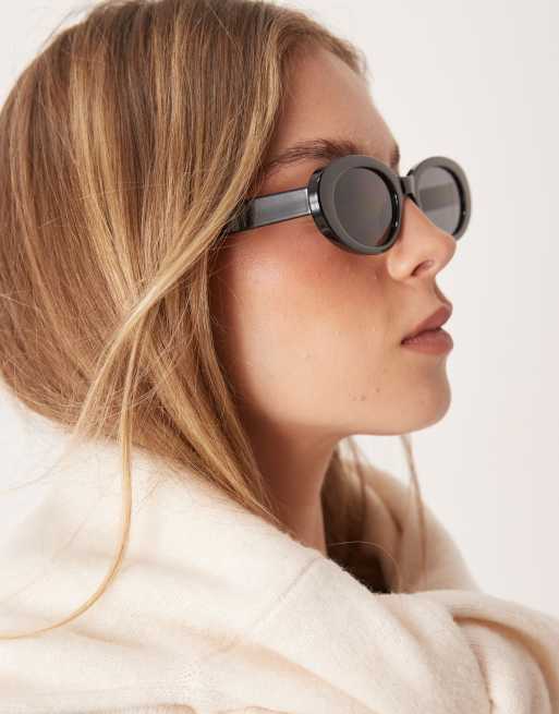 ASOS DESIGN skinny oval sunglasses in black