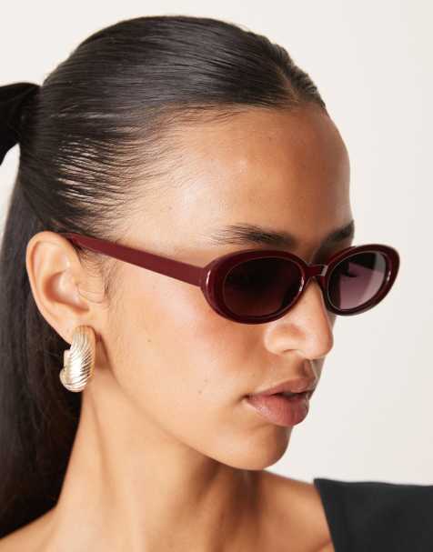 ASOS DESIGN skinny oval sunglasses in burgundy - view 1