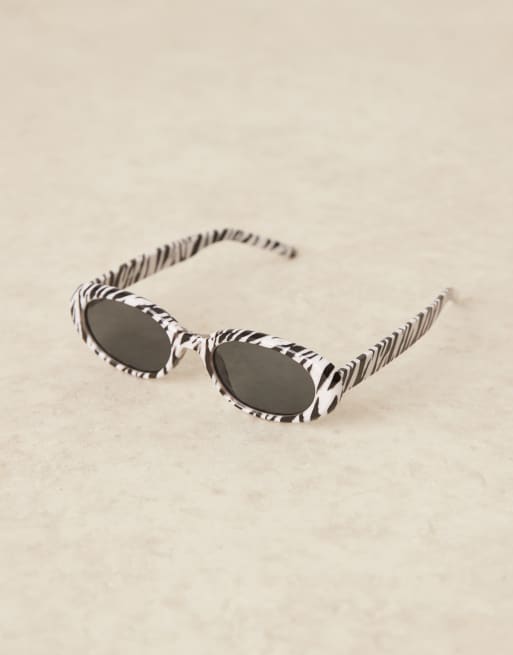 ASOS DESIGN skinny oval sunglasses in zebra | ASOS display picture 1