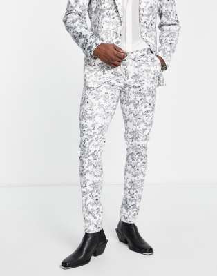 ASOS DESIGN - Skinny pantalon met bloemen in zwart met wit