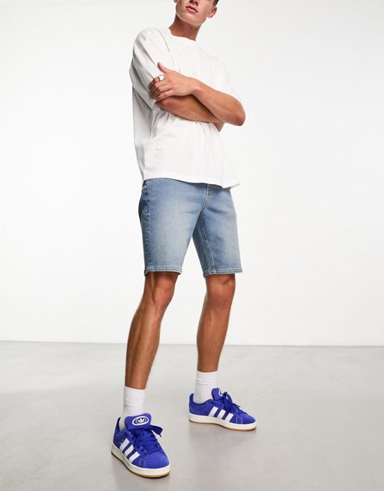 https://images.asos-media.com/products/asos-design-skinny-regular-length-denim-shorts-in-mid-wash-blue/21190312-4?$n_550w$&wid=550&fit=constrain