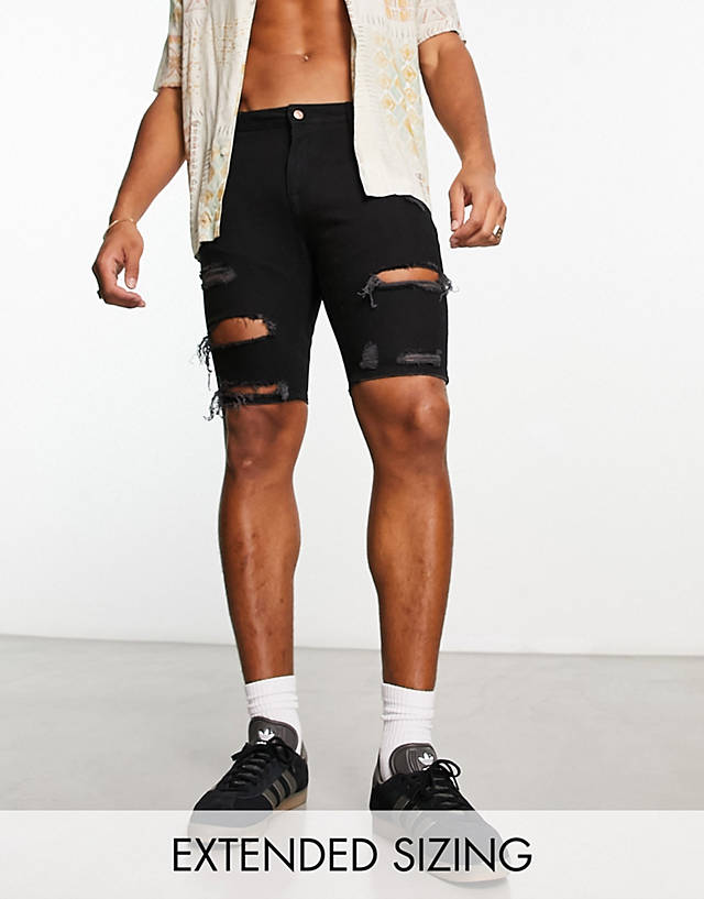 ASOS DESIGN - skinny regular length shorts in black with heavy rip
