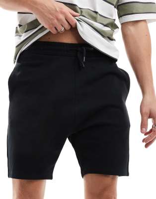 ASOS DESIGN skinny shorts in black