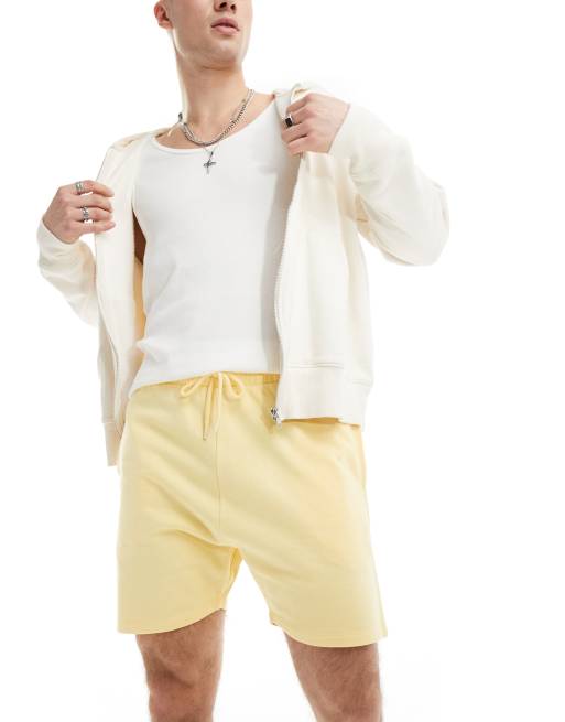 ASOS DESIGN skinny shorts in yellow ASOS