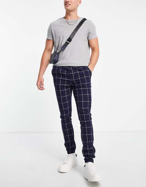 ASOS DESIGN skinny smart joggers with window check in navy