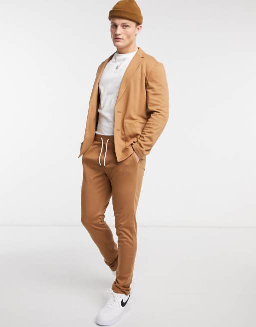 ASOS DESIGN skinny soft tailored suit trousers in jersey in tan