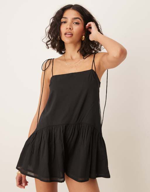 ASOS DESIGN skinny straps dropped waist full skirt romper in black
