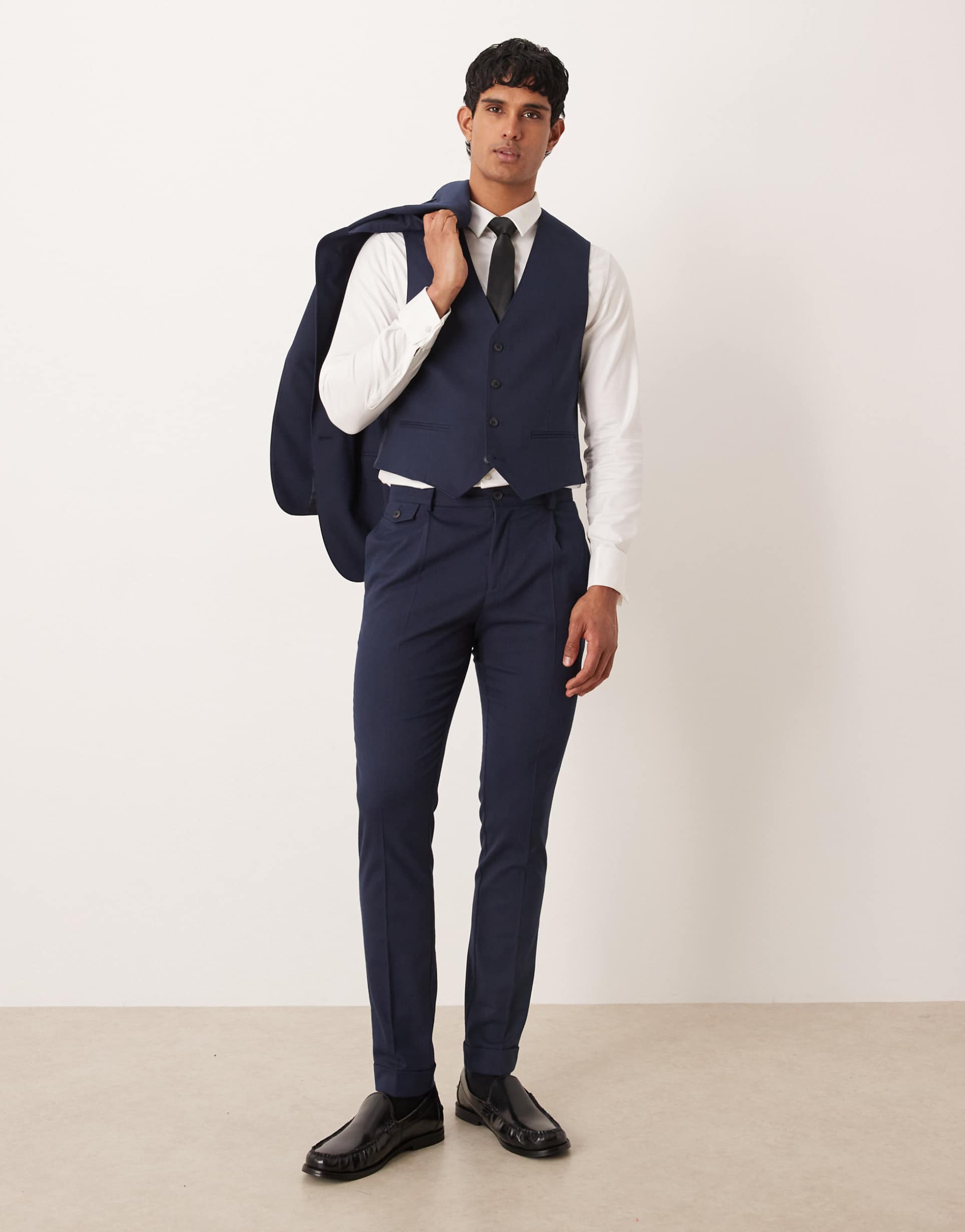 ASOS DESIGN skinny suit pants in navy herringbone flannel