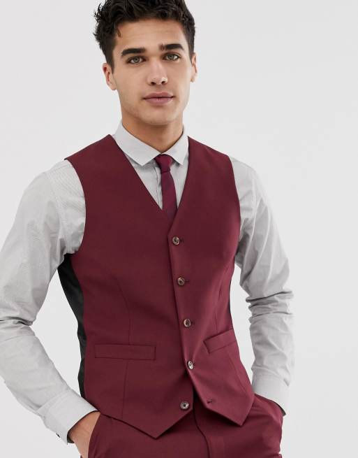 black shirt burgundy vest