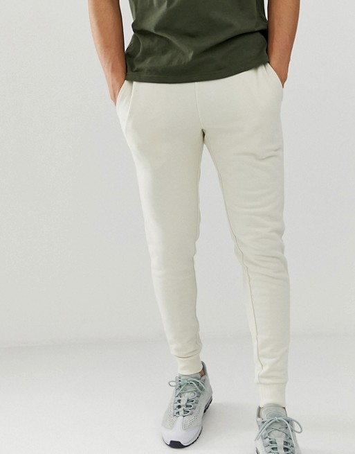 ASOS DESIGN skinny sweatpants in off white | ASOS