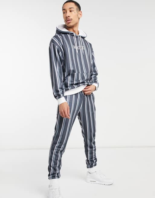 ASOS DESIGN skinny sweatpants set with all over stripe print