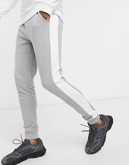 ASOS DESIGN skinny sweatpants with side stripe in gray marl
