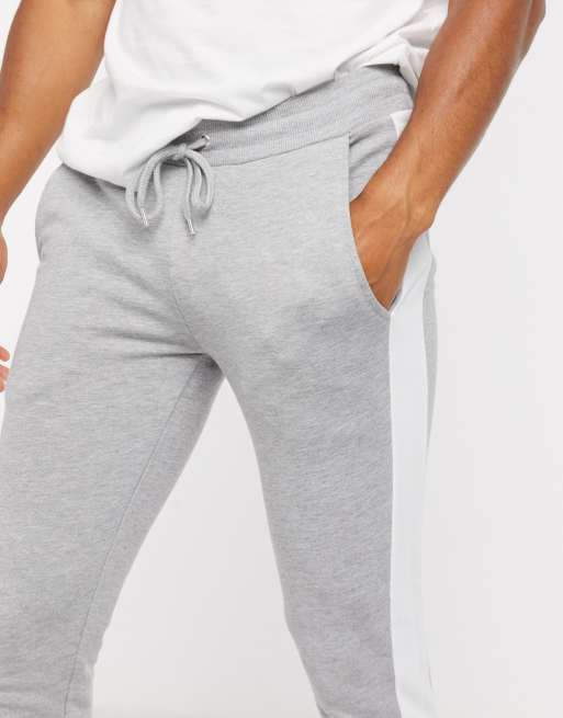 ASOS DESIGN skinny sweatpants with side stripe in gray marl