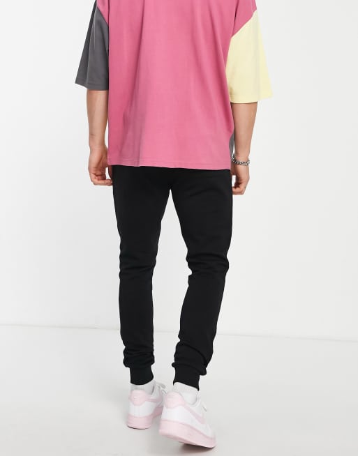 ASOS DESIGN skinny trackies in black, 2 of 4
