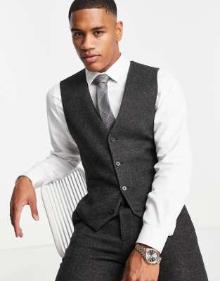 black suit and grey waistcoat