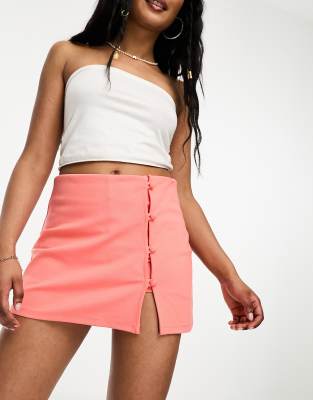 skort with side buttons in coral-Orange