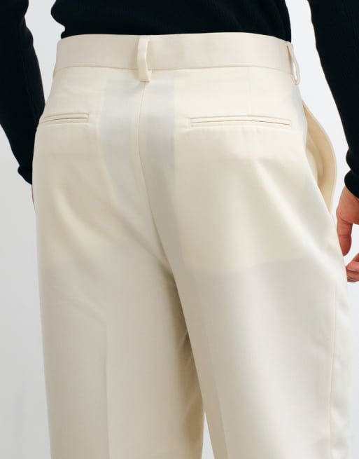 ASOS DESIGN skræddersyede plisserede afslappede tapered-bukser i smørgul, 4 af 5