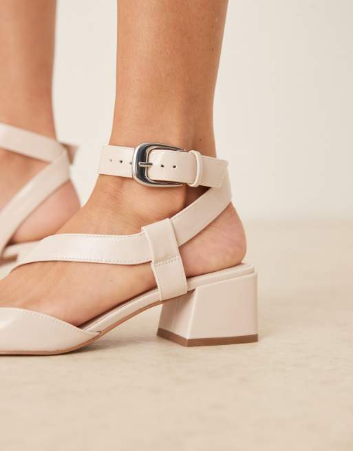 ASOS DESIGN Skye asymmetric strap detail mid block heel shoes in white