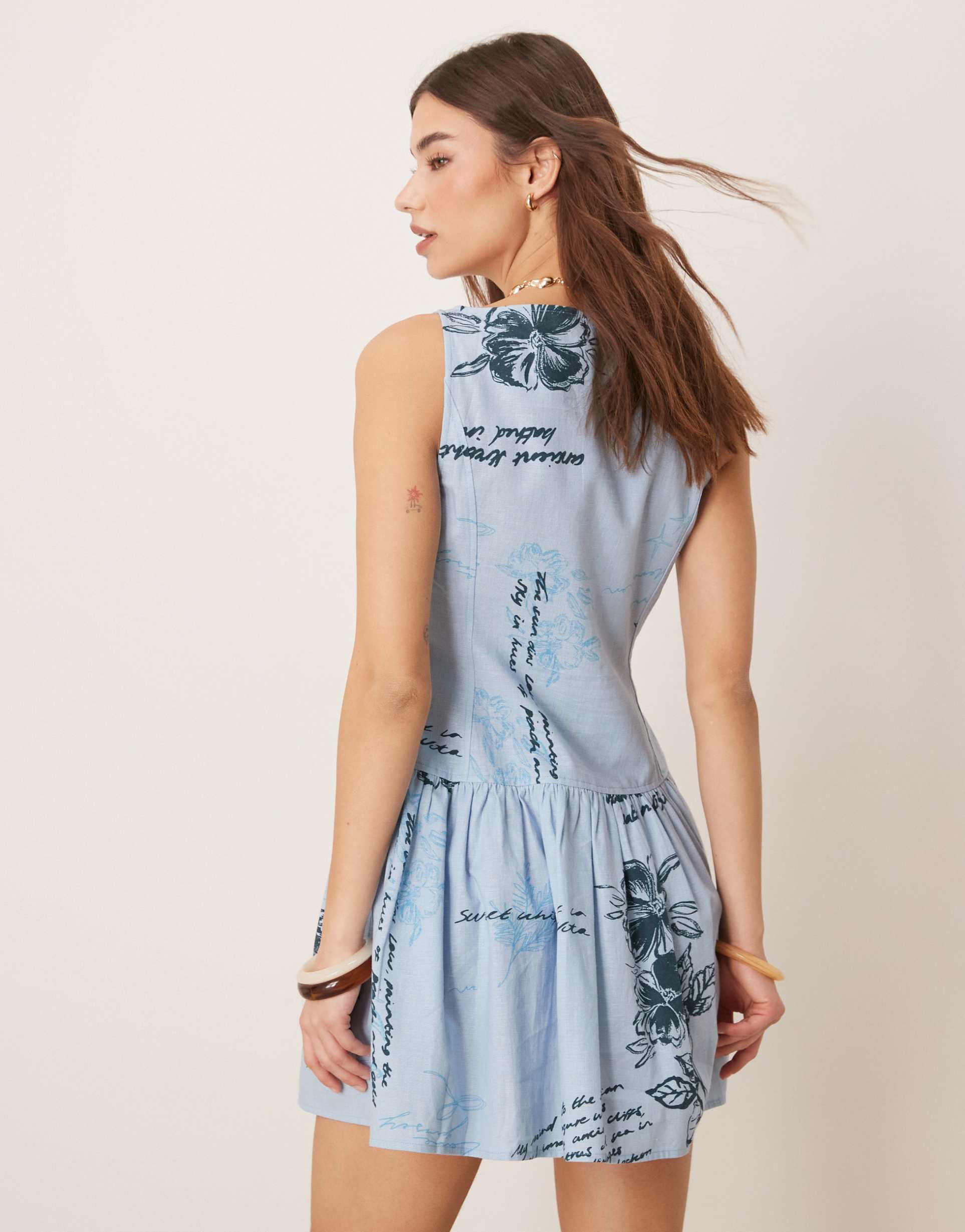 asos design slash neck button down dropped waist mini dress in blue floral print