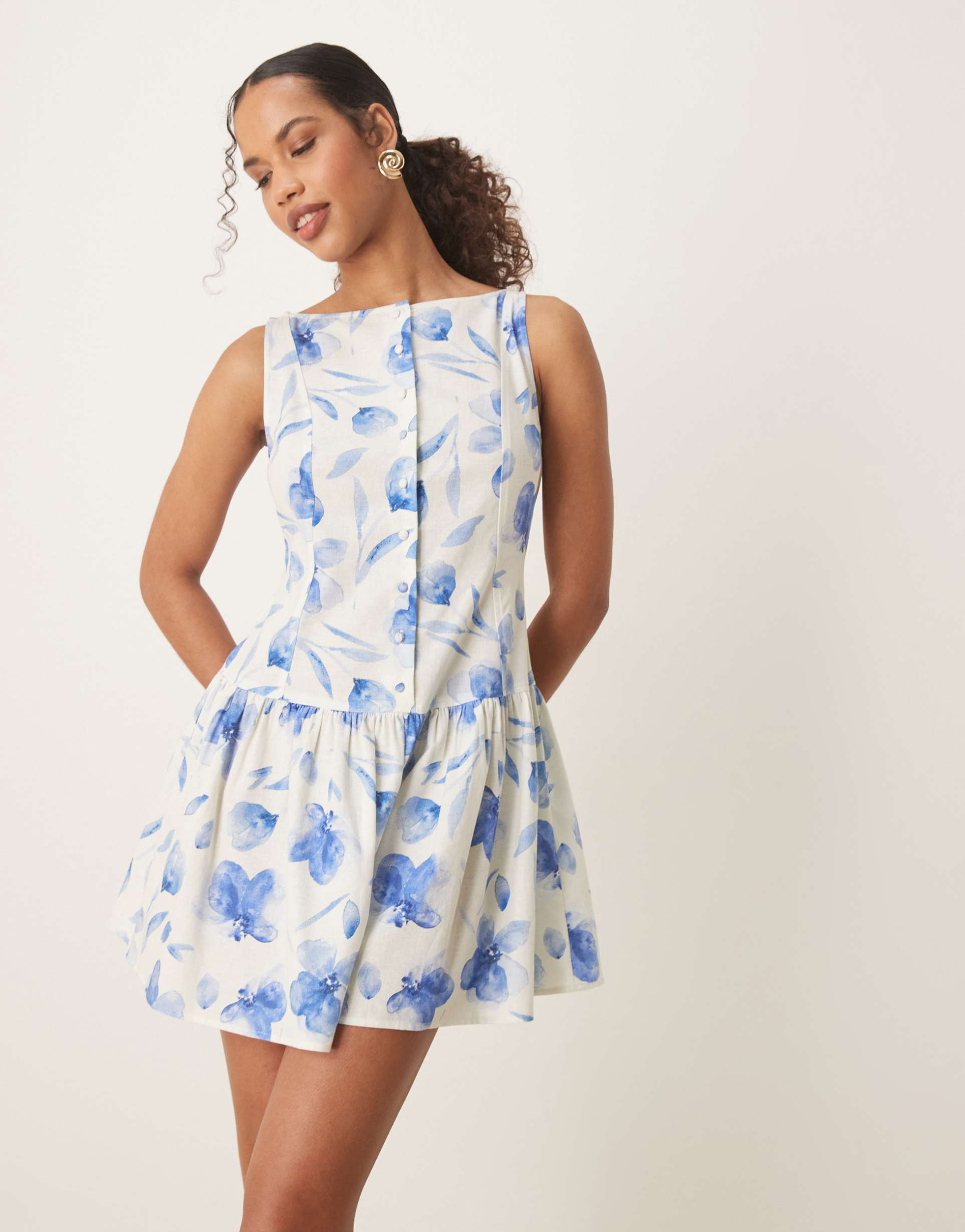 asos design slash neck button down dropped waist mini sundress in blue painted print