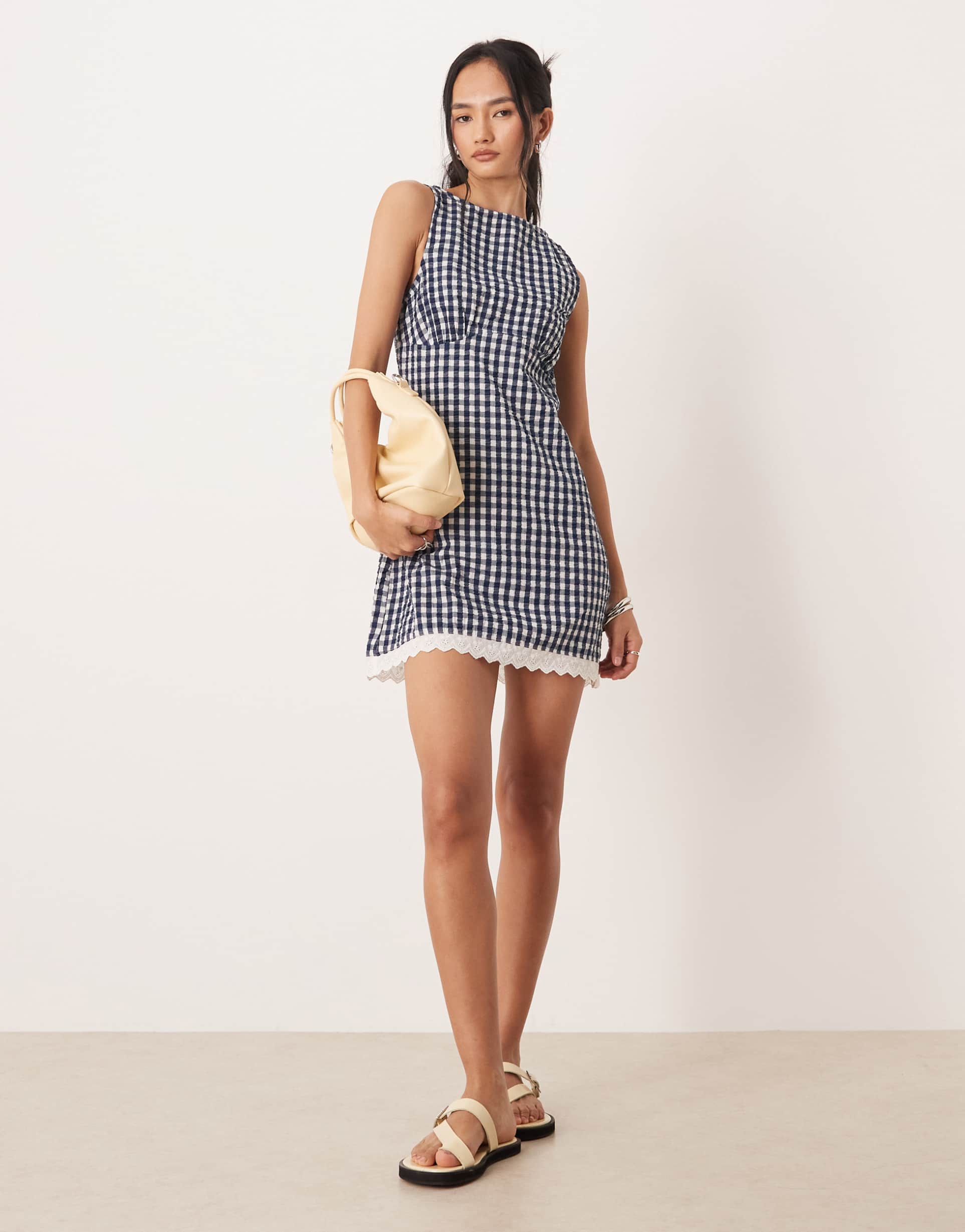 asos design slash neck mini sundress with sculpted bust and eyelet hem in navy gingham