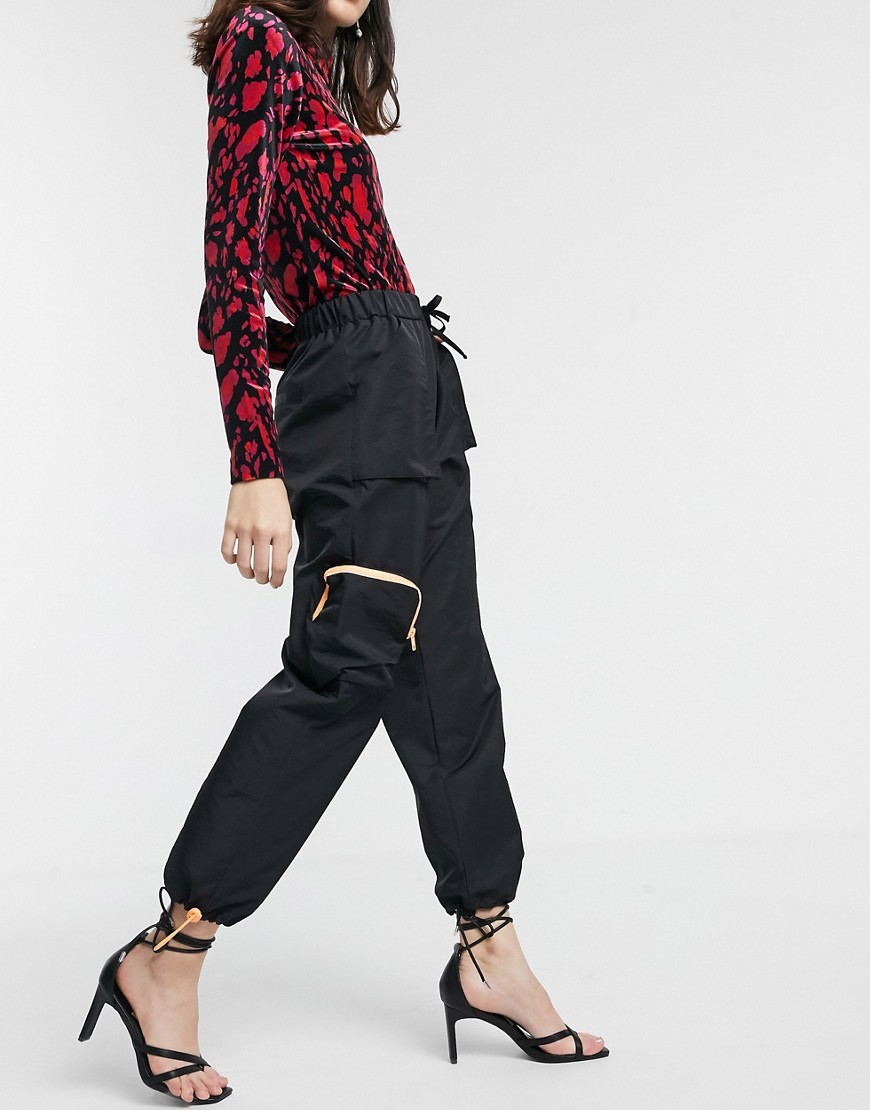 ASOS DESIGN sleek sweatpants with 3D pockets in black