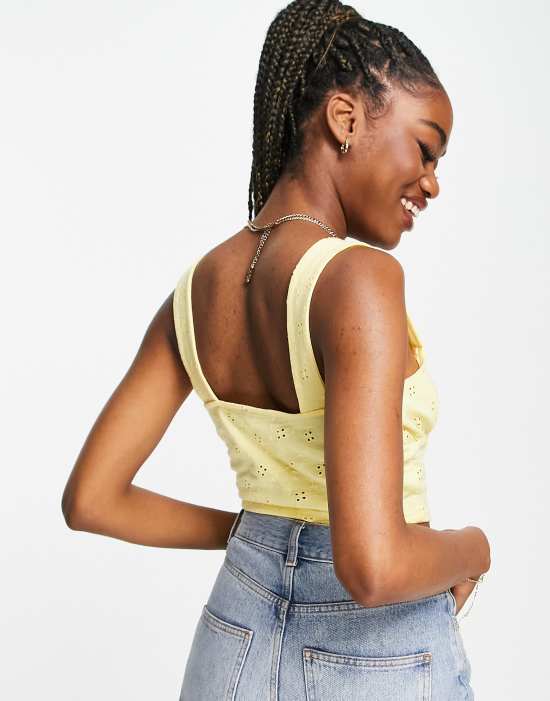 https://images.asos-media.com/products/asos-design-sleeveless-eyelet-corset-top-in-yellow/201477945-4?$n_550w$&wid=550&fit=constrain