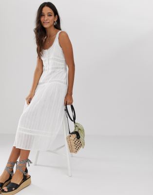 sleeveless lace midi dress