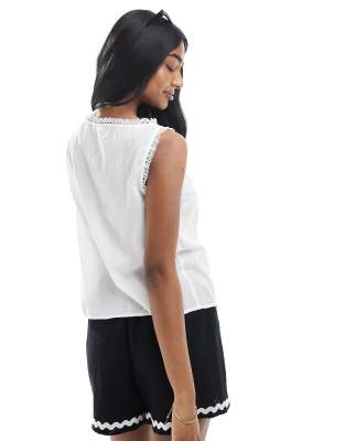 asos design sleeveless lace trim top with ribbon tie detail in white