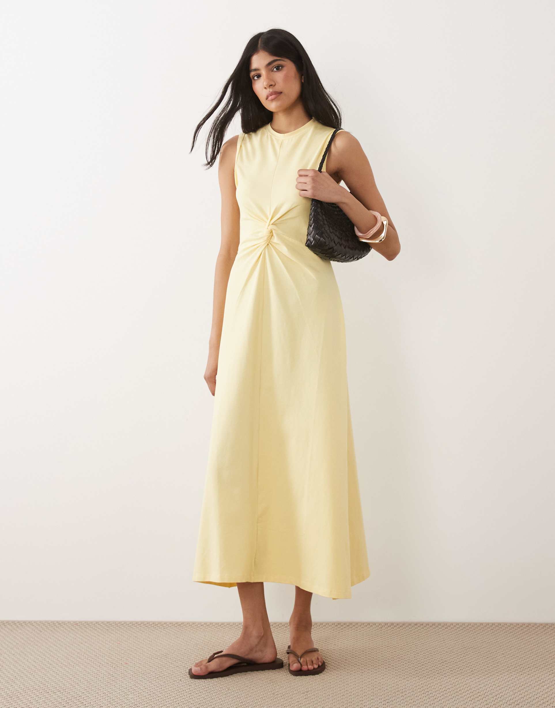 asos design sleeveless maxi dress with knot detail in buttermilk yellow