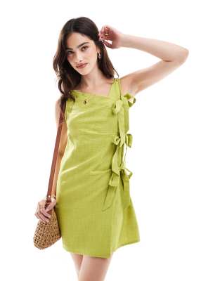 sleeveless mini wrap dress with bow tie side in sage green